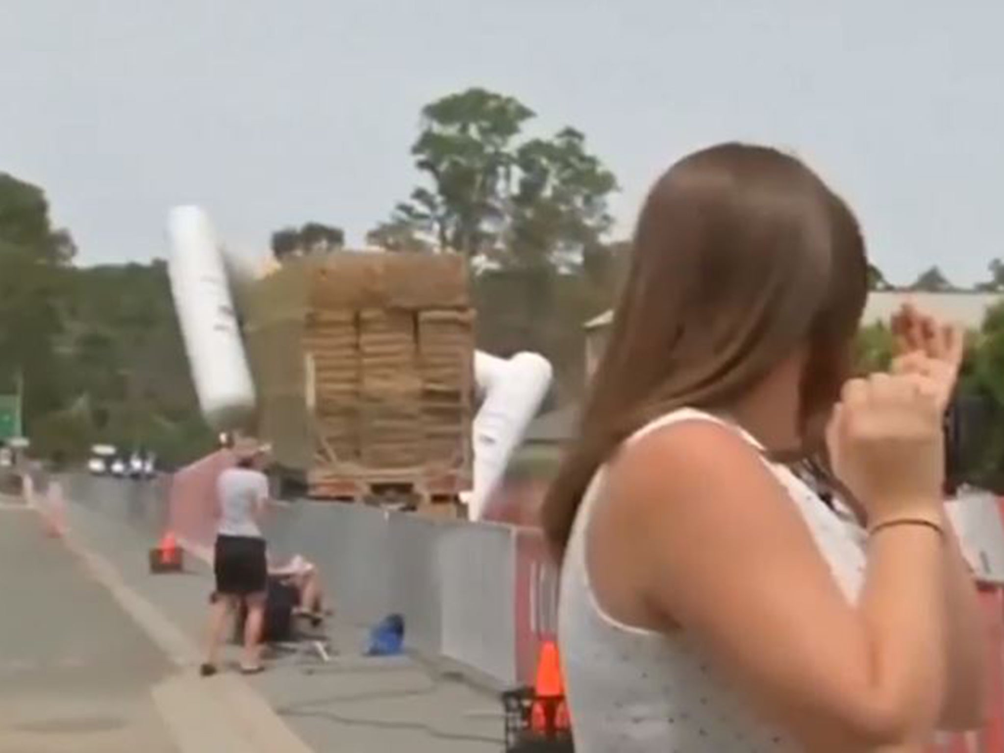 The finish line was dragged down the street with the driver unaware at what had happened