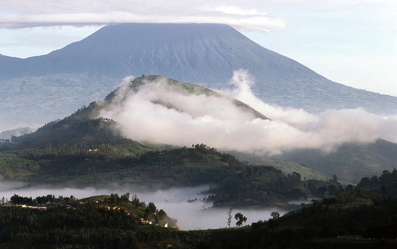 Early morning clouds lifting over Virunga Volcanoes Rwanda (Getty/iStock)