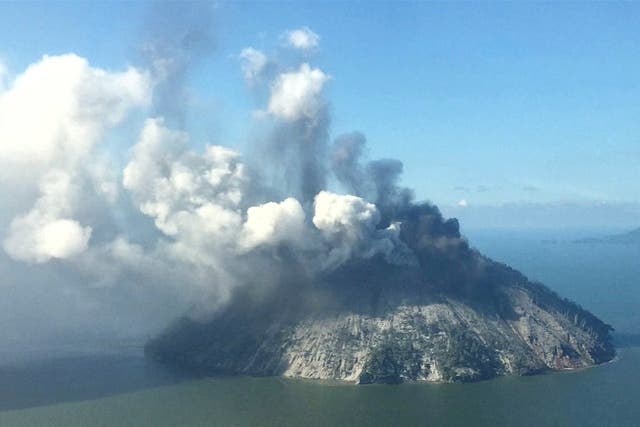 The remote island volcano of Kadovar spews ash into the sky in Papua New Guinea. Pictured on 6 January.