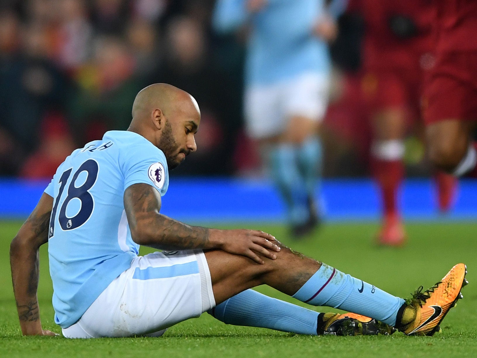 Fabian Delph went down with a knee problem shortly after the half hour mark