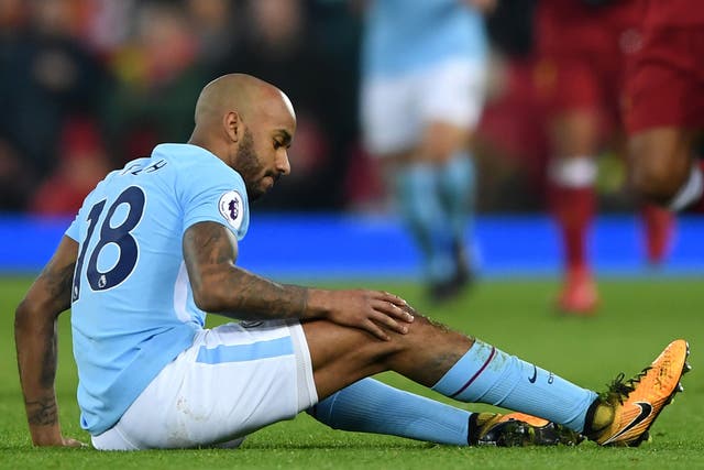 Fabian Delph went down with a knee problem shortly after the half hour mark