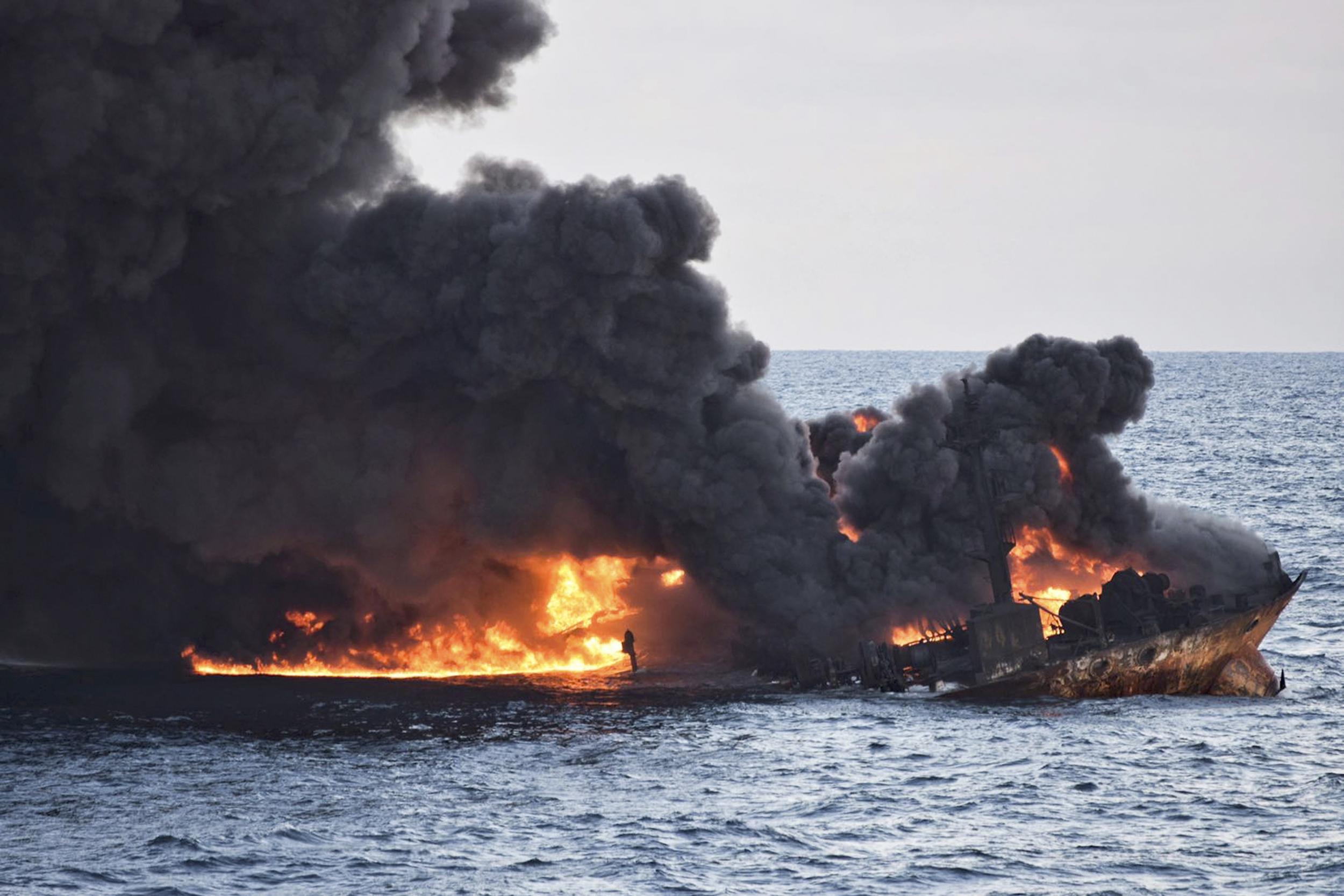 The wreckage of the burning Iranian oil tanker sank on Sunday, adding to concerns about its impact on the marine environment