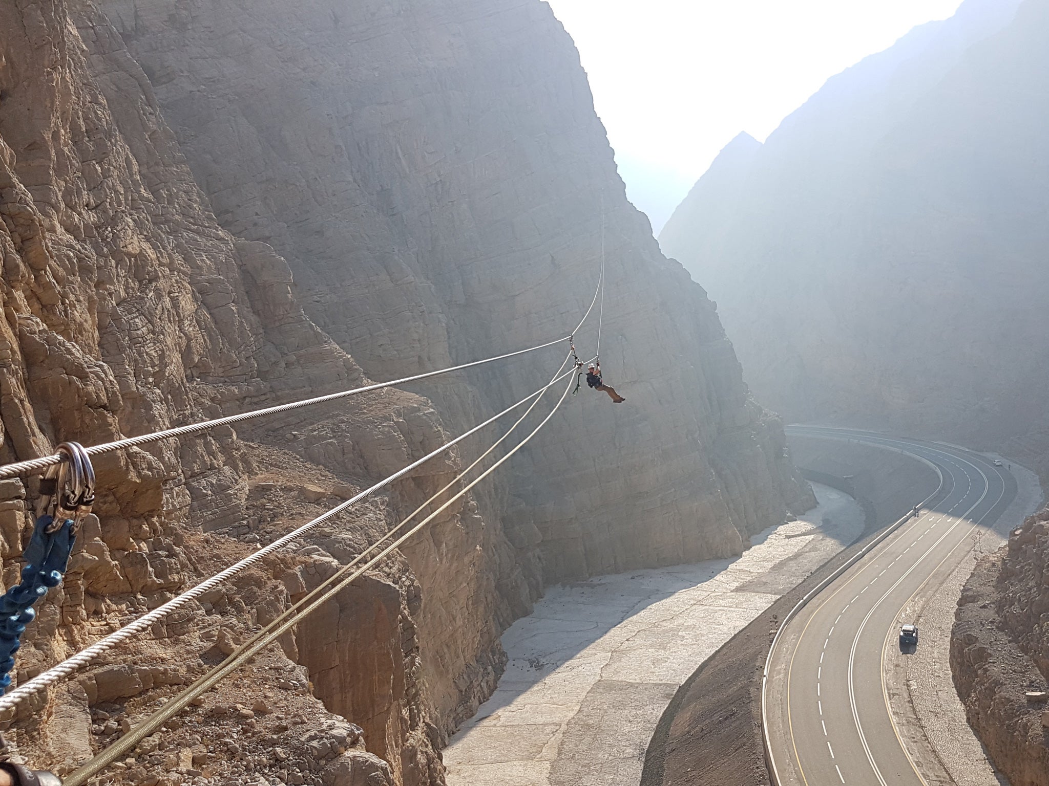 The 300m zipline runs in full view of the road leading to the summit