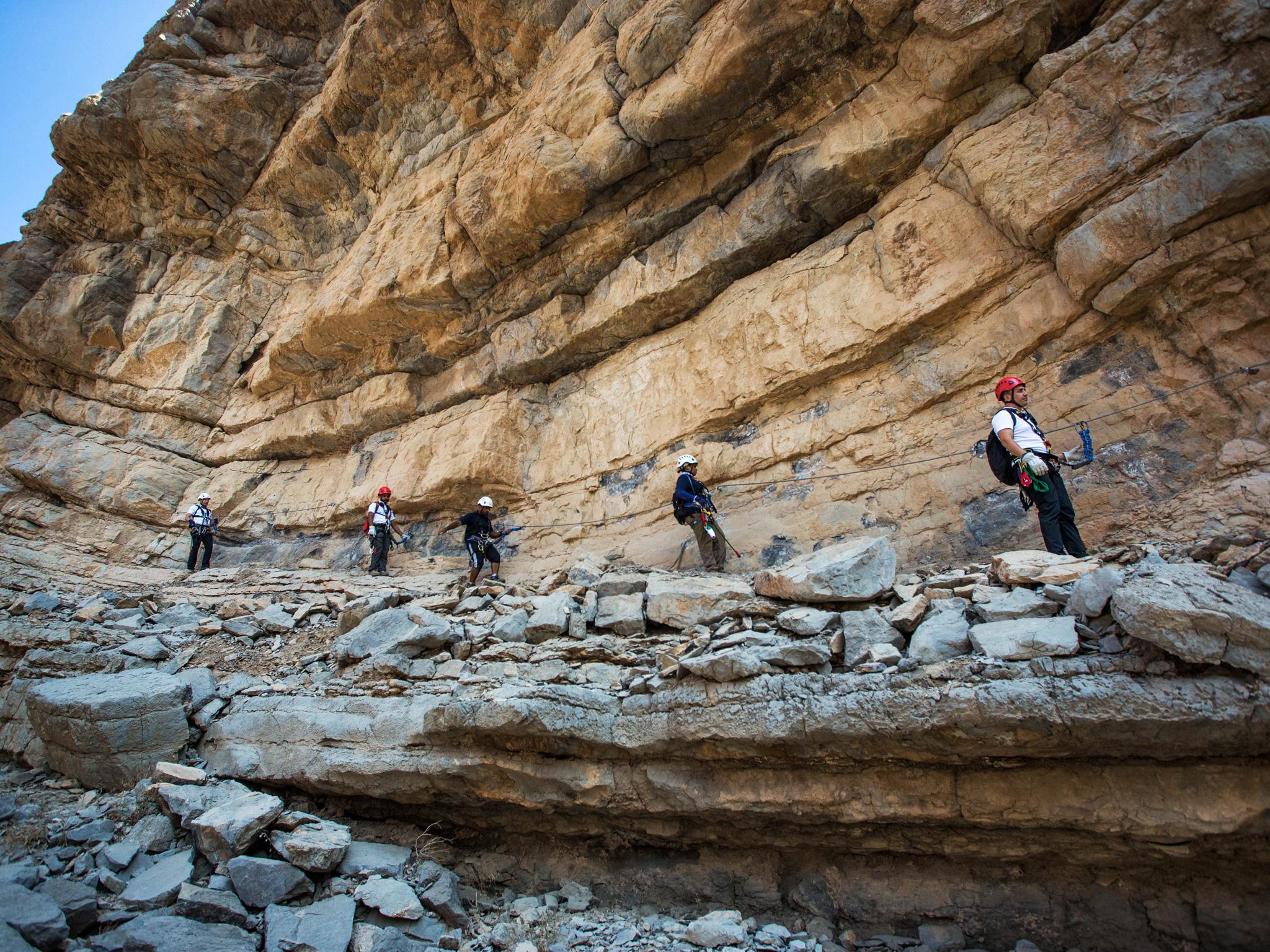 Visitors tackling the RAK via ferrata, a 1km course that includes three ziplines
