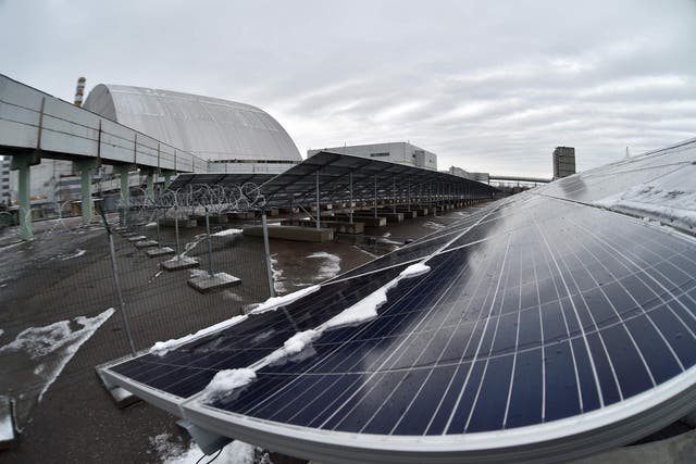 Photovoltaic panels on the new one-megawatt power plant, metres from Chernobyl's exploded nuclear reactor