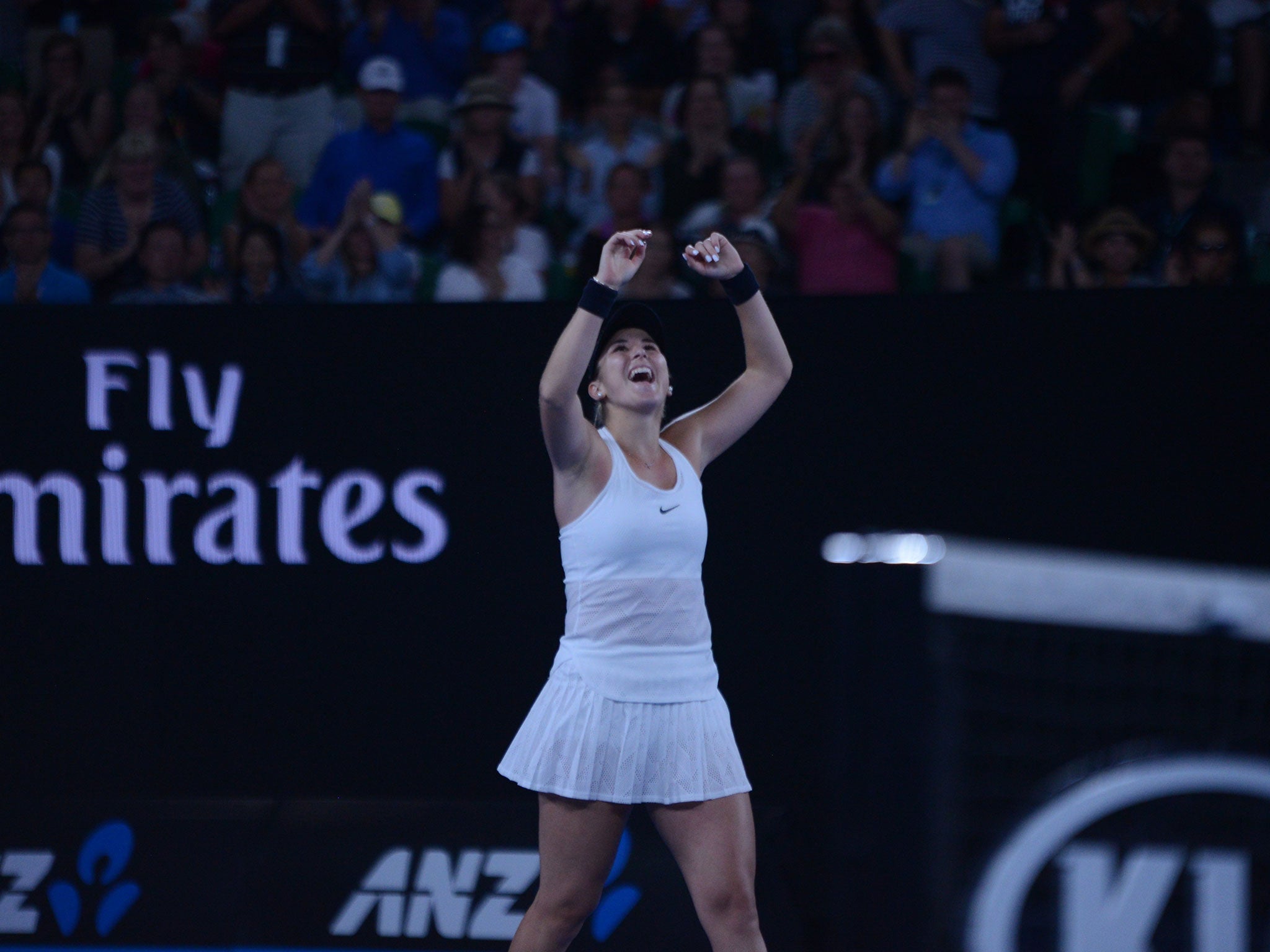 Belinda Bencic celebrates her surprise victory over Venus Williams