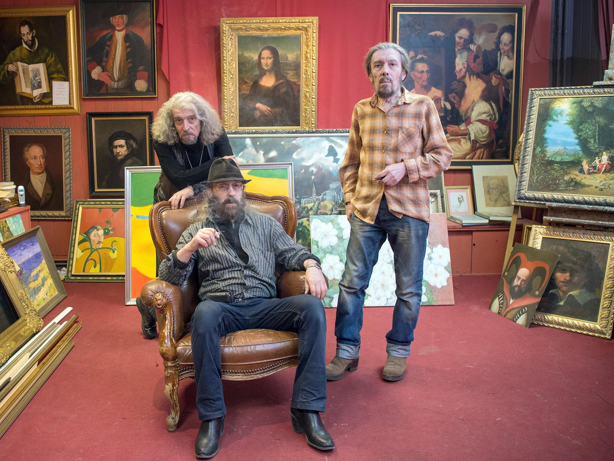 Posing in their Berlin art salon, the brothers (from left) Eugen, Michael and Semjon Posin are making a fortune copying great paintings