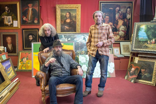 Posing in their Berlin art salon, the brothers (from left) Eugen, Michael and Semjon Posin are making a fortune copying great paintings