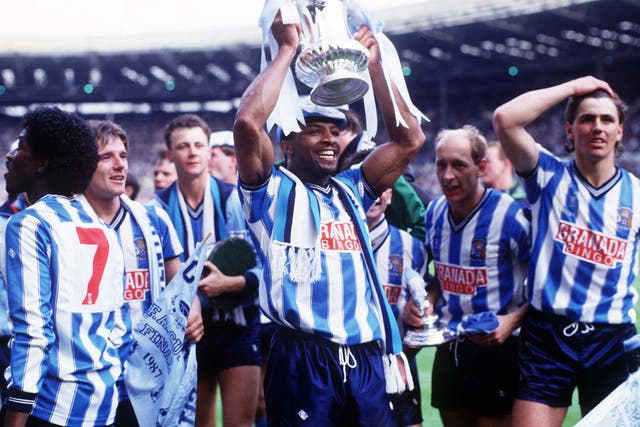 Regis lifts the FA Cup in 1987 after Coventry City beat Tottenham Hostpur 3-2