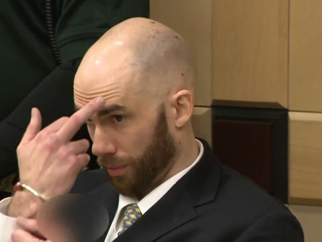 Peter Avsenew gave the finger to the families of his victims after being sentenced to death