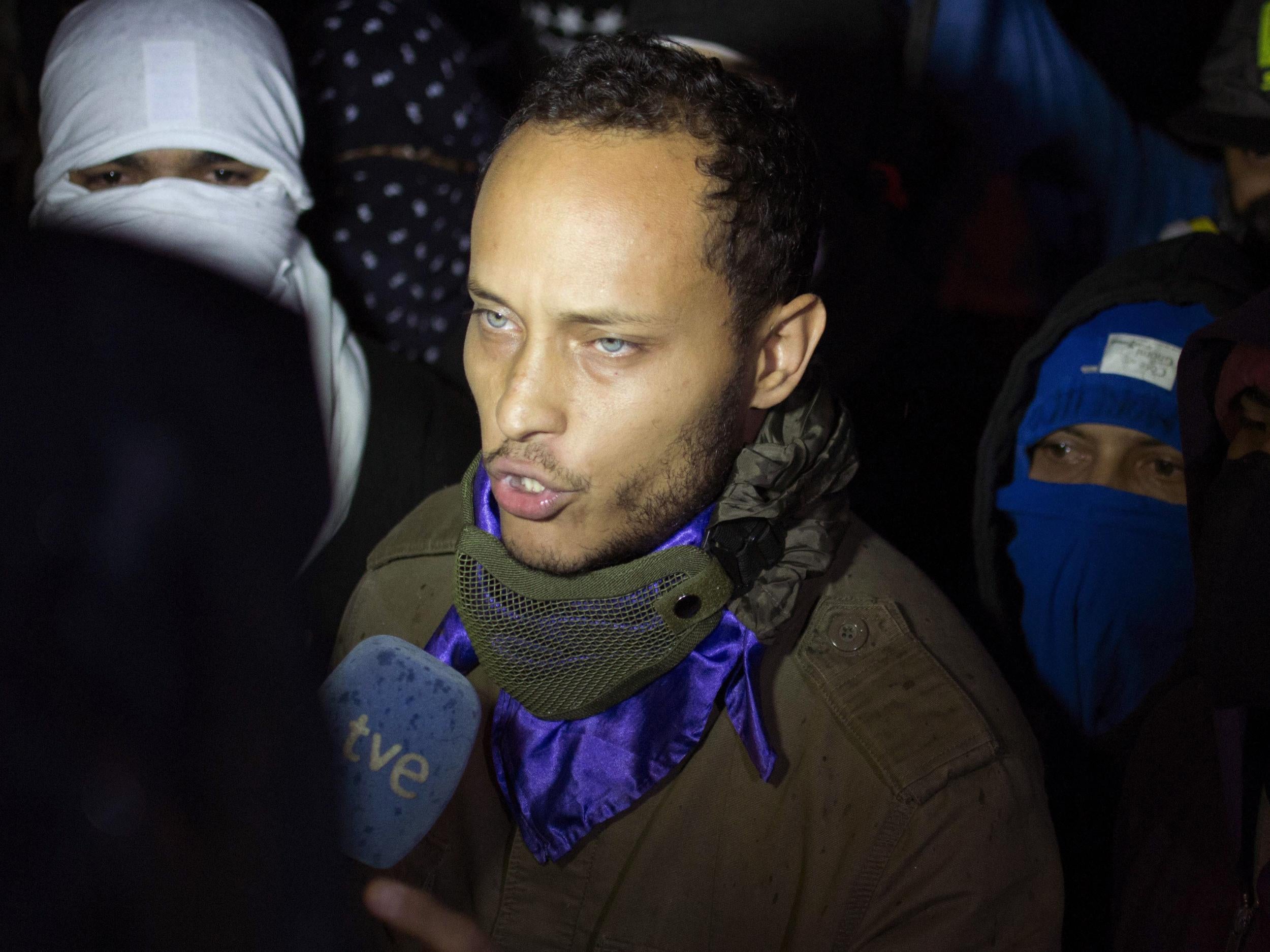 In this July 13, 2017 file photo, Oscar Perez speaks to the press at a night vigil to honor the more than 90 people killed during three months of anti-government protests, in Caracas, Venezuela