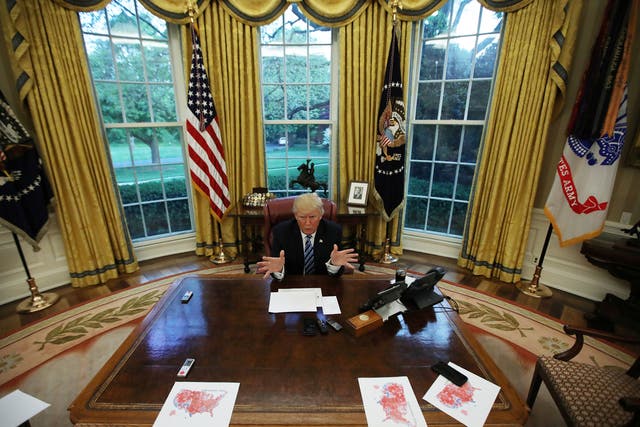  US President Donald Trump in the Oval Office of the White House