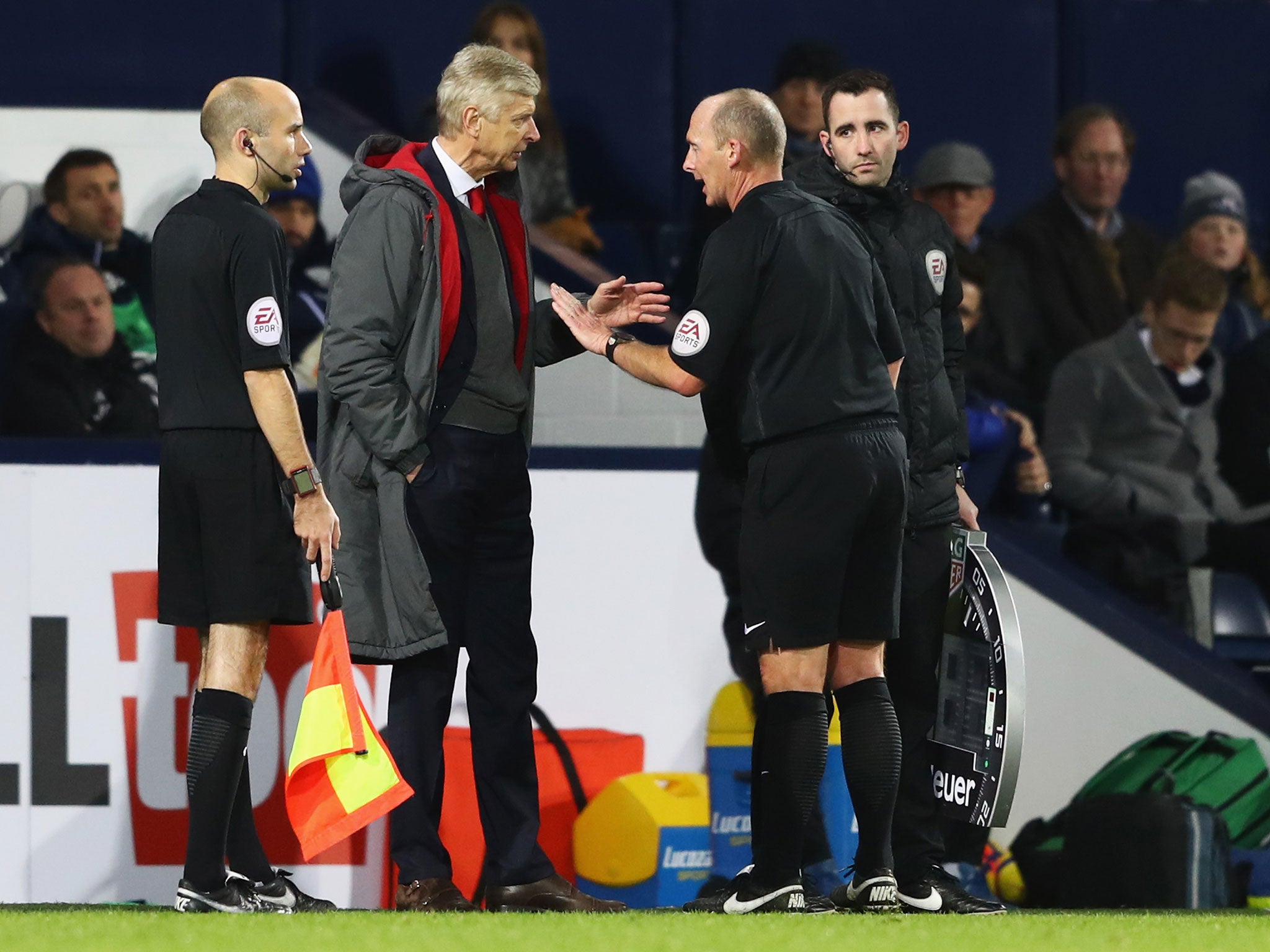 Arsene Wenger confronts Mike Dean during Arsenal's 1-1 draw with West Brom