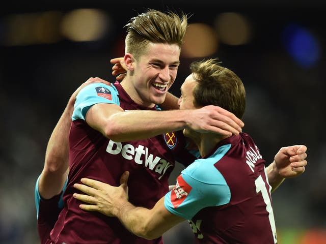 Reece Burke celebrates scoring the winner for West Ham