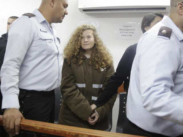 Ahed Tamimi is brought to a courtroom inside the Ofer military prison near Jerusalem
