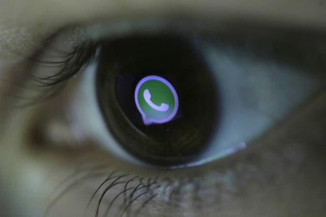 A picture illustration shows Whatsapp's logo reflected in a person's eye, in central Bosnian town of Zenica, March 13, 2015