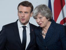 Macron persuades May to take more 'humane approach' to child migrants