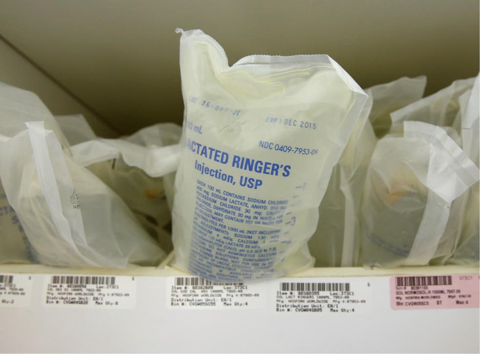 Bags of saline sit in a closet waiting to be used at Intermountain Healthcare's Utah Valley Regional Medical Center in Provo, Utah