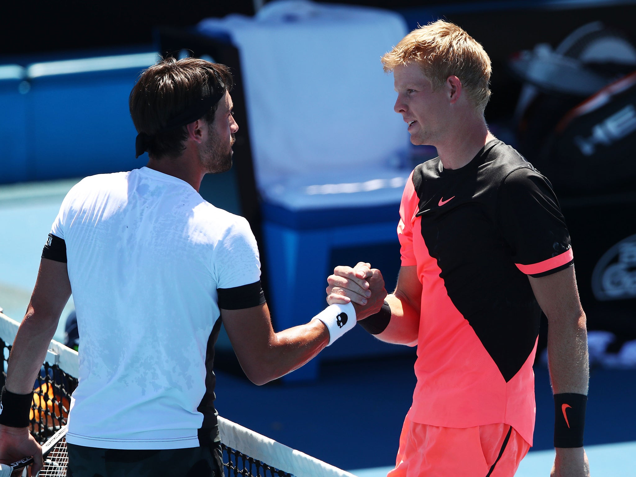 &#13;
Edmund is congratulated by Basilashvili following his victory &#13;