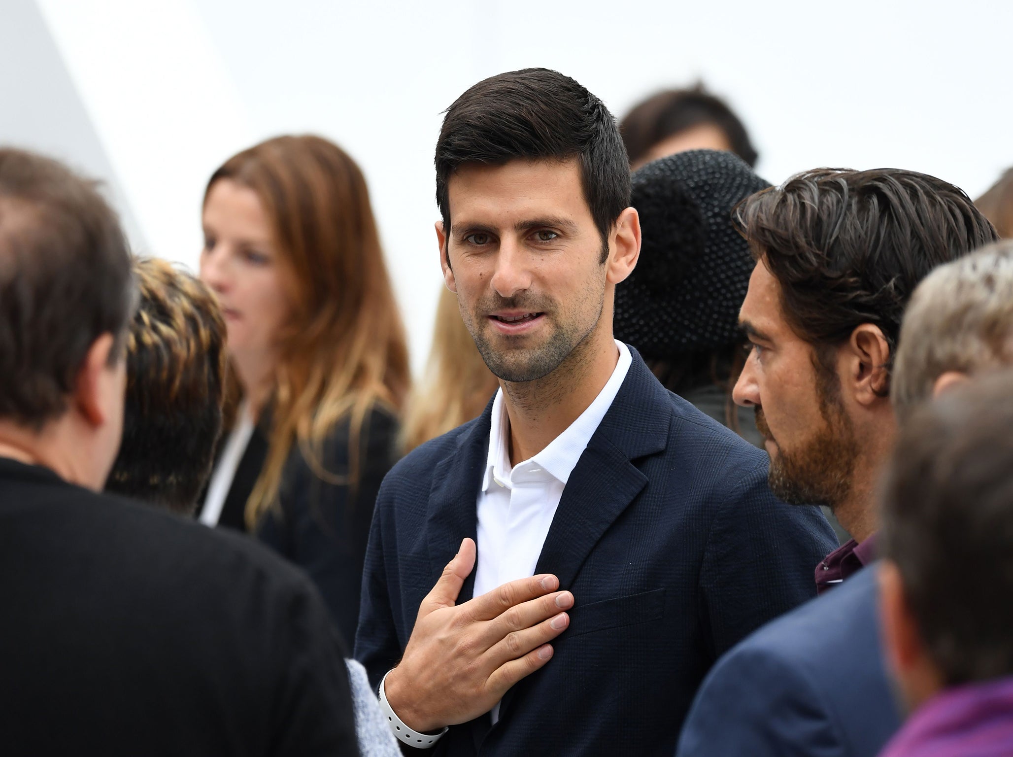 A philosophical Djokovic looks on