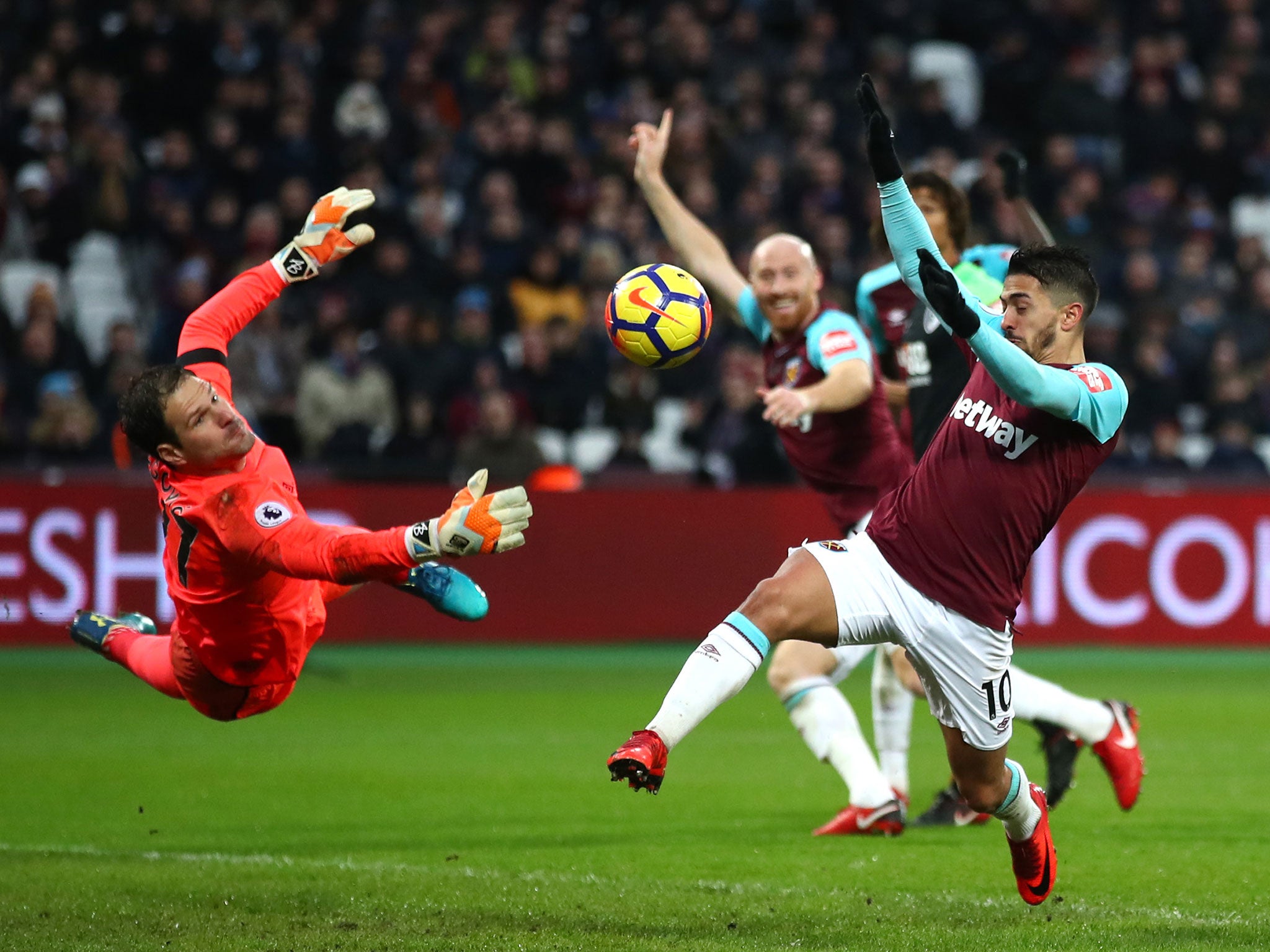 Asmir Begovic saves a shot from Manuel Lanzini