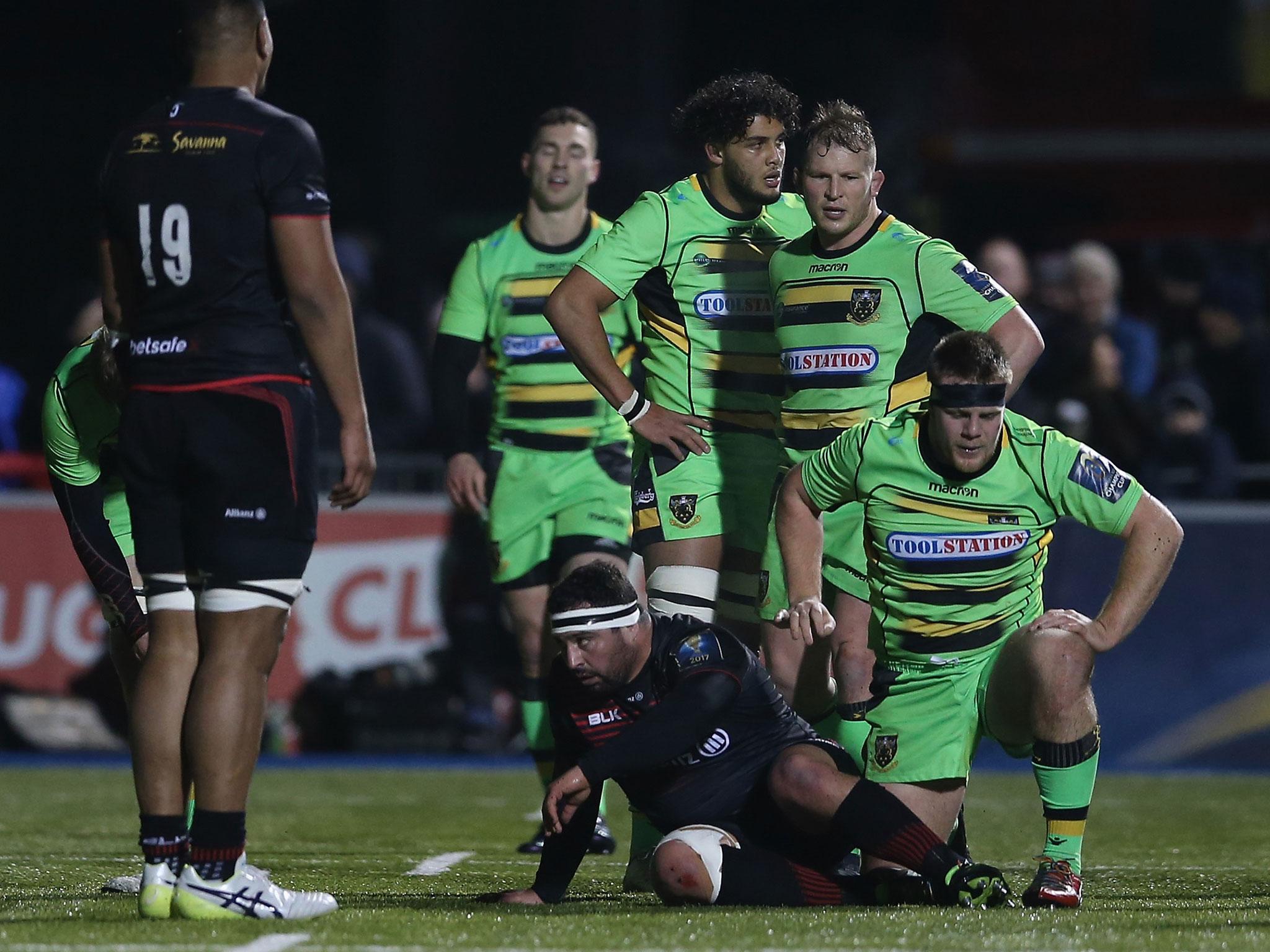 &#13;
Saints look dejected as they struggle to hold back Saracens &#13;