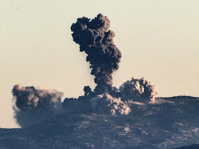 Smoke billows on the Syrian side of the border at Hassa near Hatay, southern Turkey