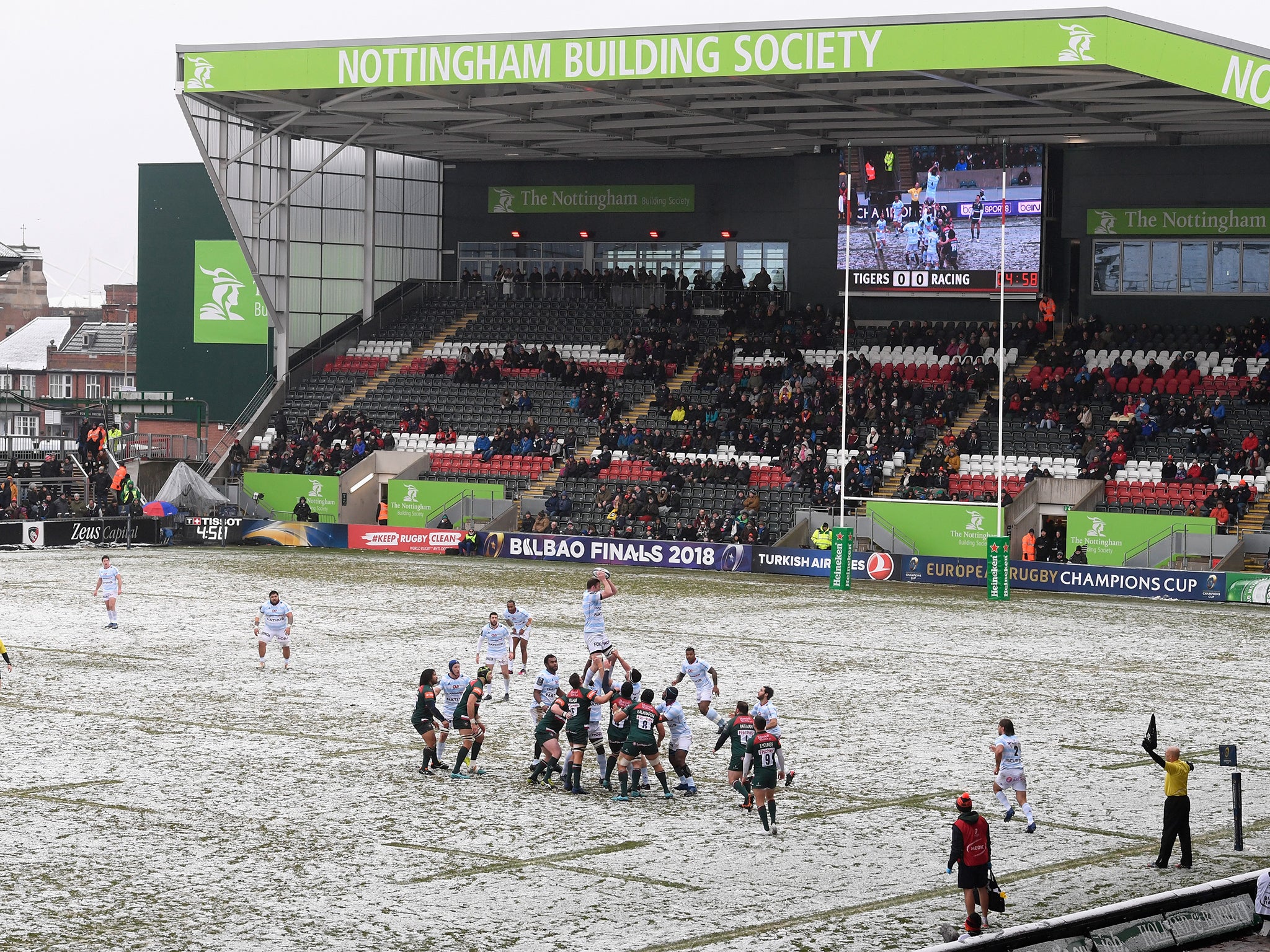 The match took place a a snow-covered half-empty Welford Road