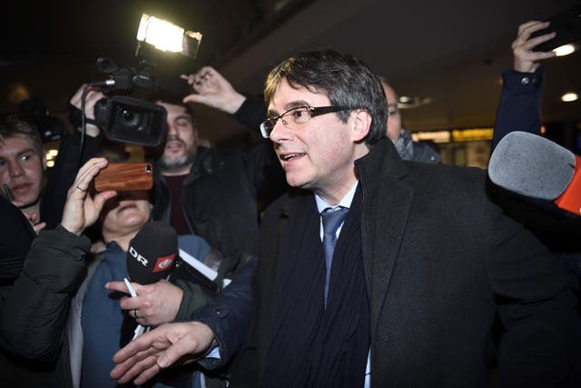 Former Catalan leader Carles Puigdemont is surrounded by journalists upon his arrival at Copenhagen Airport, Denmark, 22 January 2018