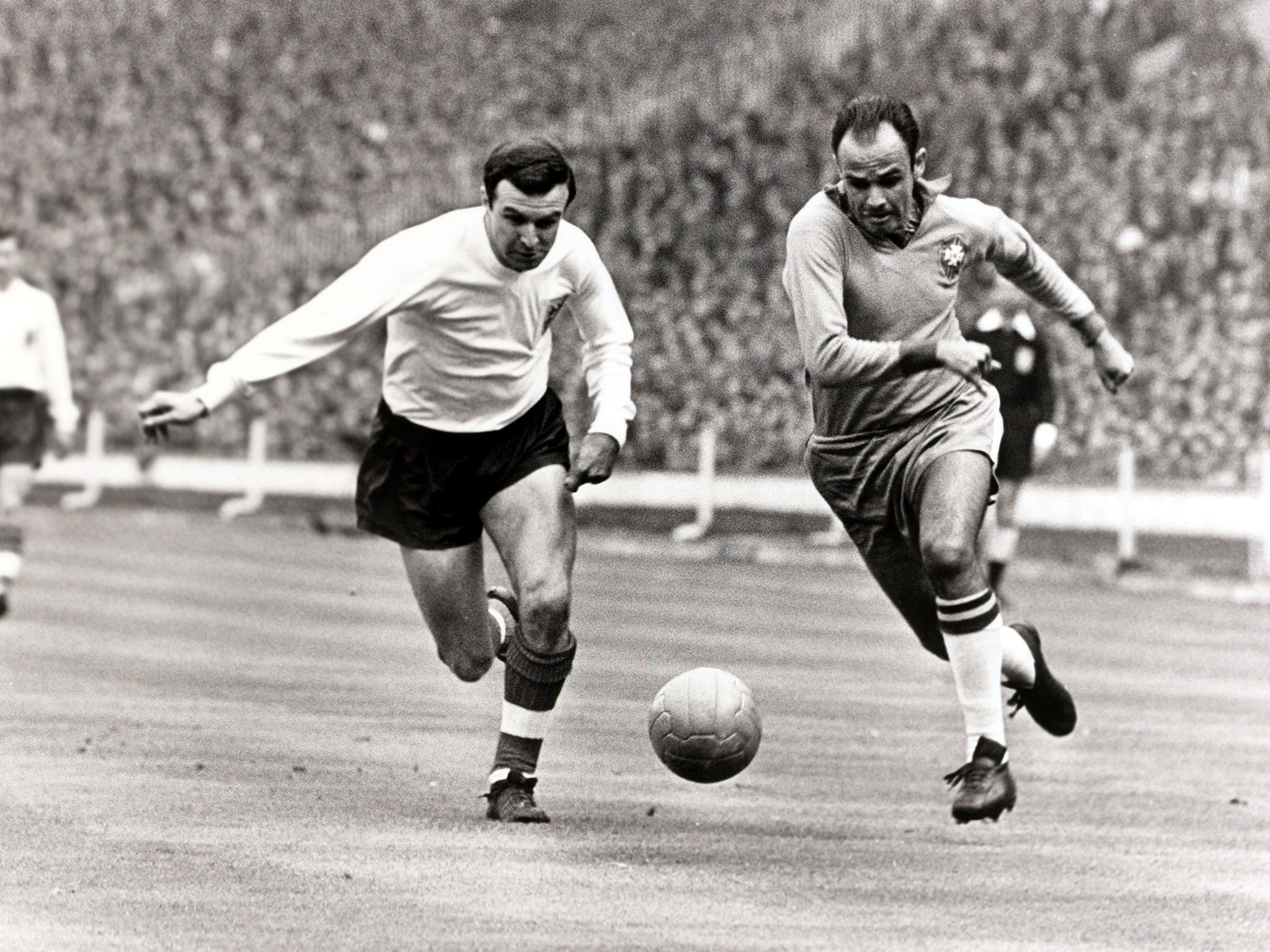 Jimmy Armfield in a race for the ball with Pepe during a friendly between England and Brazil at Wembley in May 1963