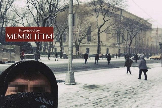 A supposed Isis supporter poses in front of New York Metropolitan museum, posted on 30 December 2017. The caption that appeared on the social messaging platform Telegram, with the original post said, "We are in your home"