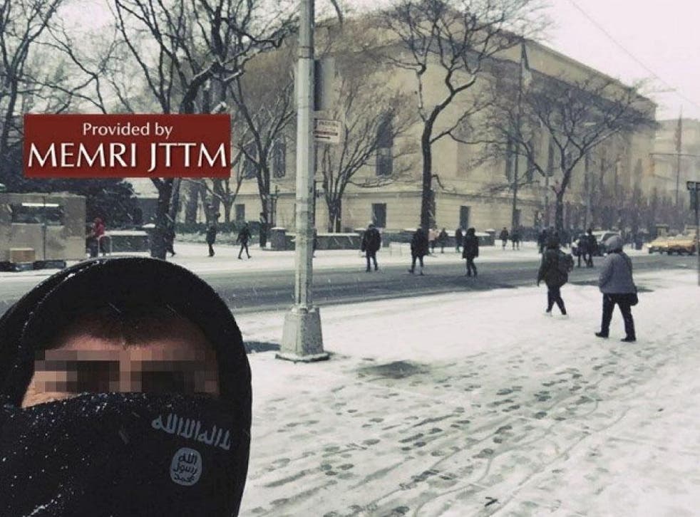 A supposed Isis supporter poses in front of New York Metropolitan museum, posted on 30 December 2017. The caption that appeared on the social messaging platform Telegram, with the original post said, "We are in your home"