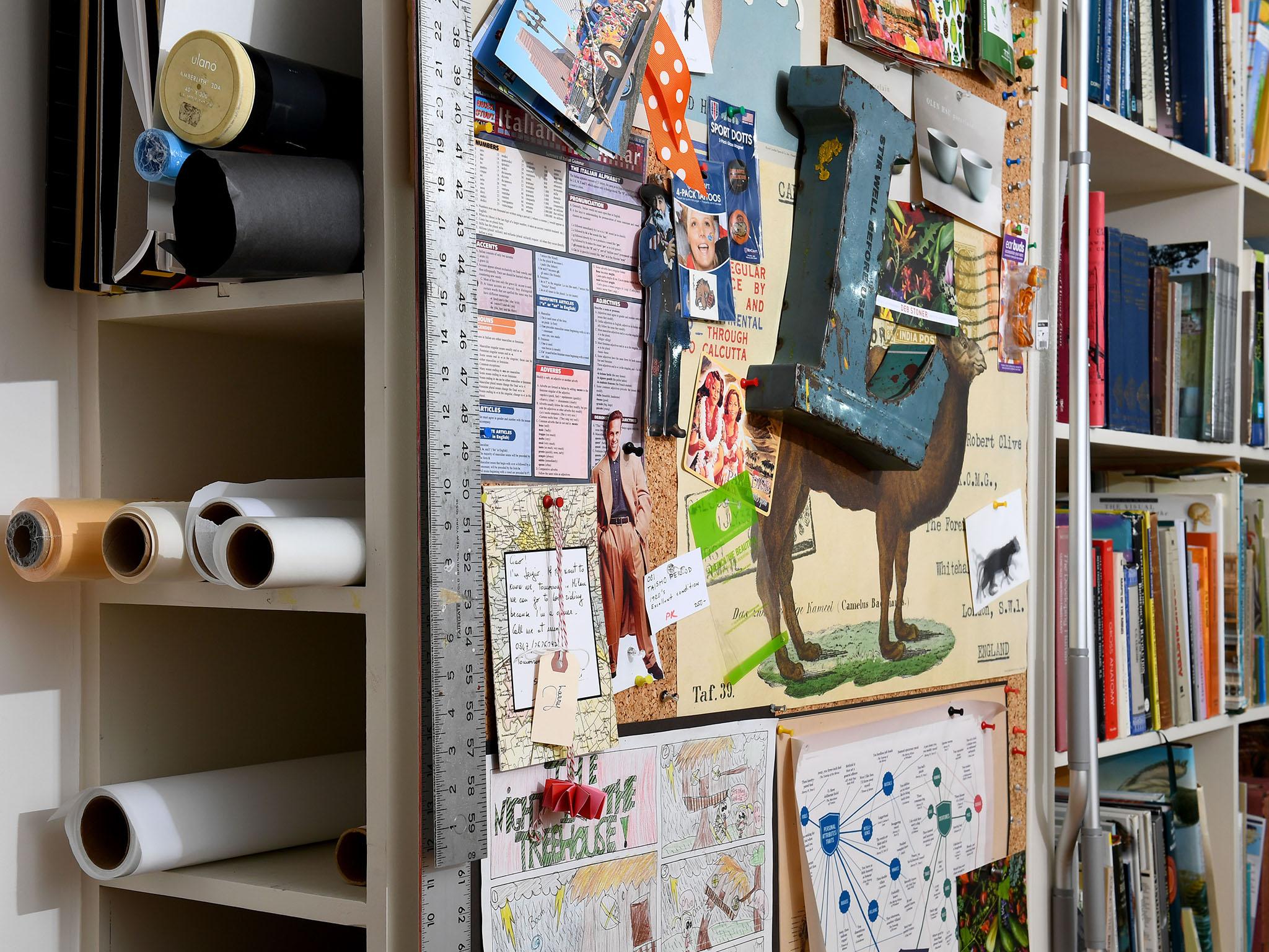 Built-ins include cubbies for paper, a corkboard and bookcases