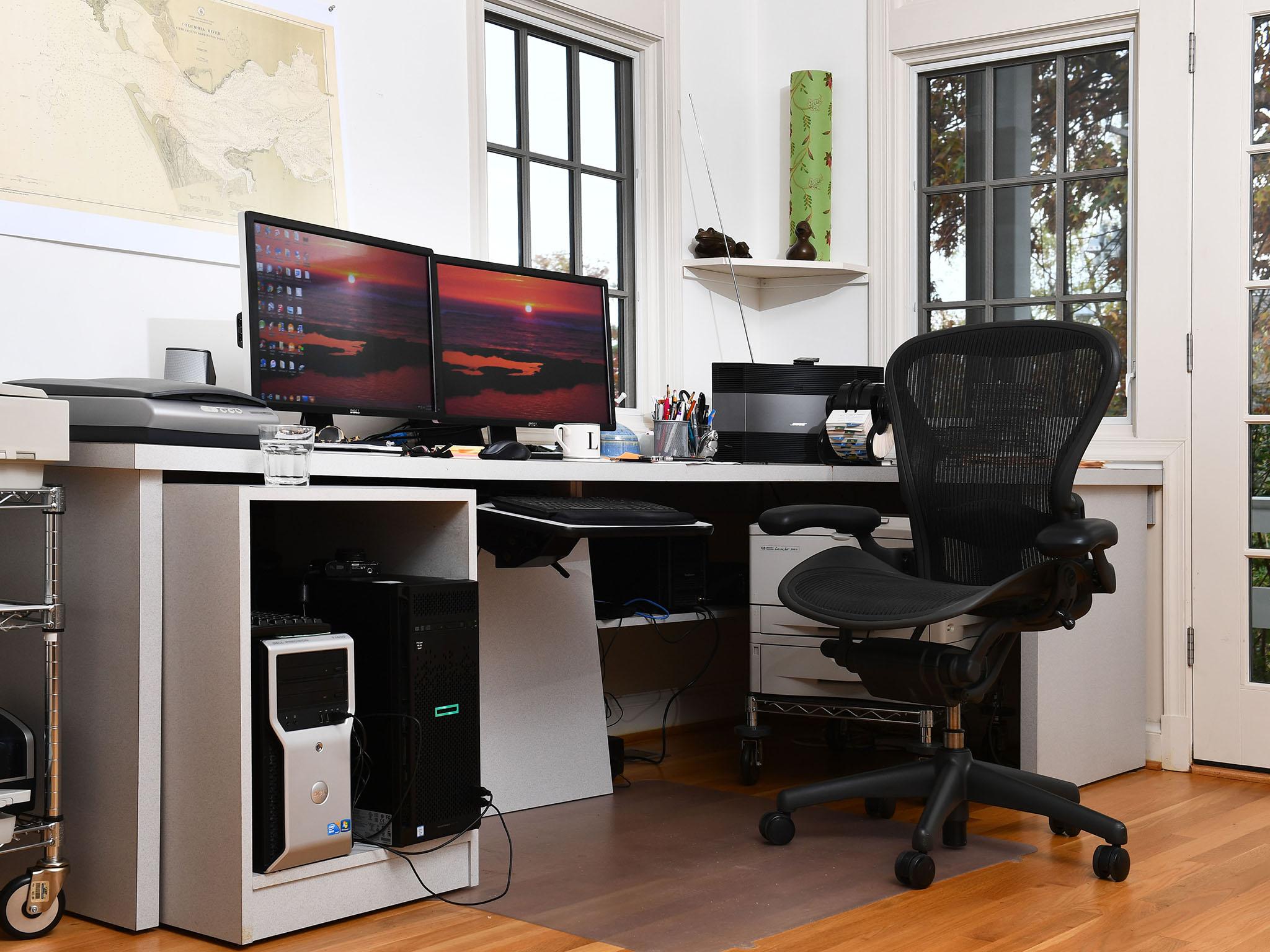 Artist Larry Kirkland planned his home office with distinct work areas that each have ample natural light