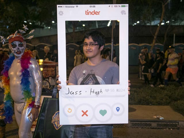Joel Balcita shows his homemade Tinder App costume at the West Hollywood Halloween Costume Carnaval, which attracts nearly 500,000 people annually, in West Hollywood, California October 31, 2015