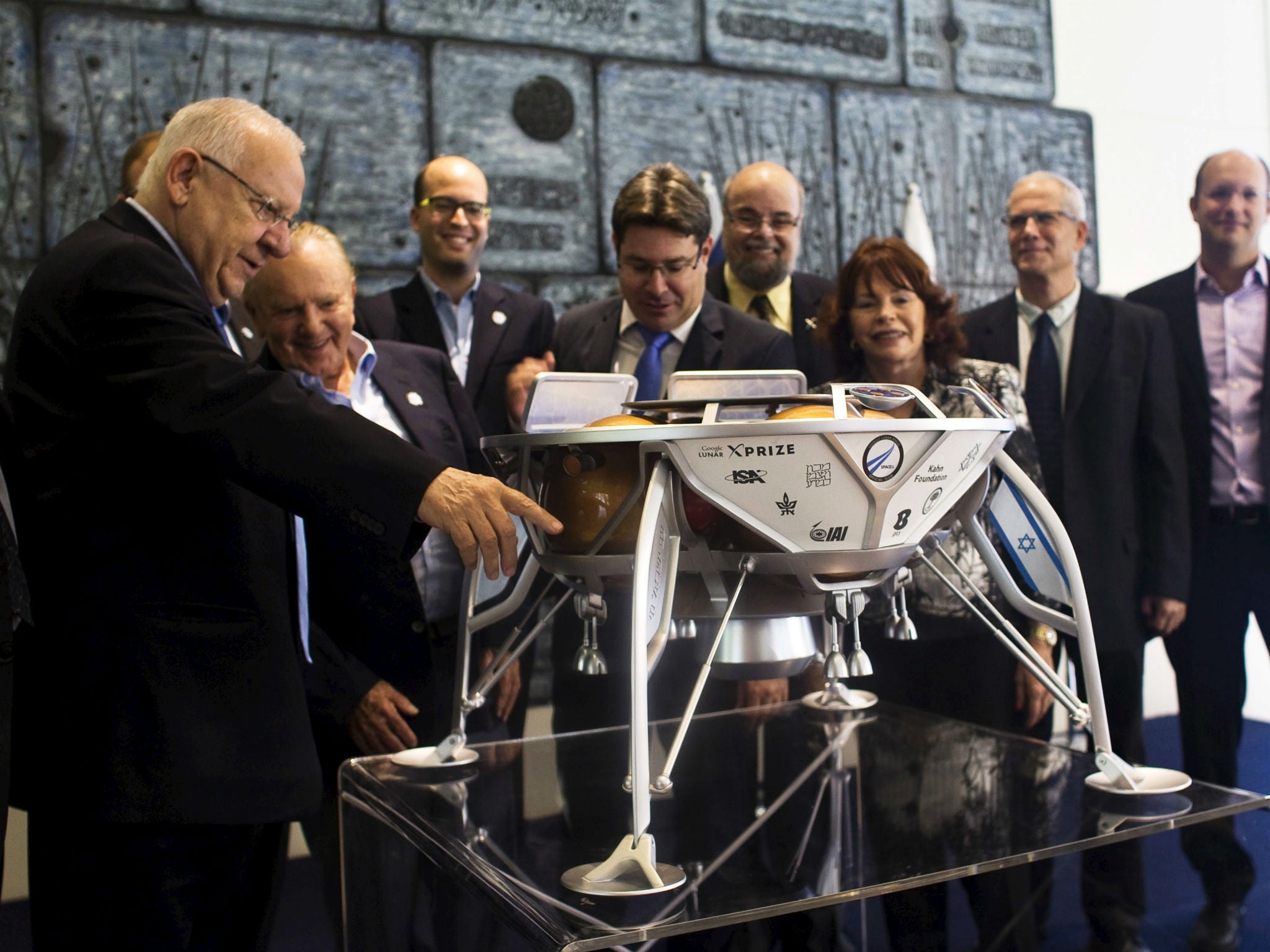 Israeli officials and members of the Israeli team vying for the Google moon prize