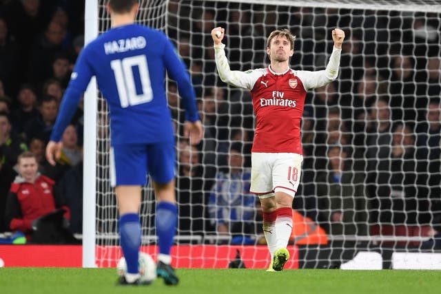 Nahco Monreal, Arsenal's unlikely but indispensable hero, celebrates the 2-1 victory over Chelsea