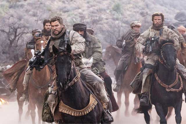 Chris Hemsworth (left) and his men take to the saddle in the Afghanistan-set ‘12 Strong’