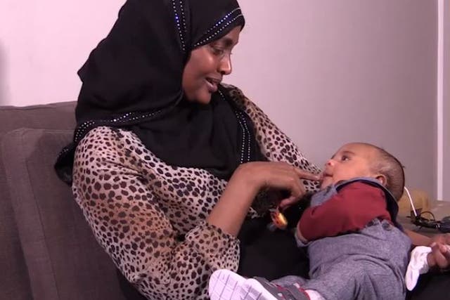 Grenfell Tower fire survivor Maryam Adam and her son Mohammed