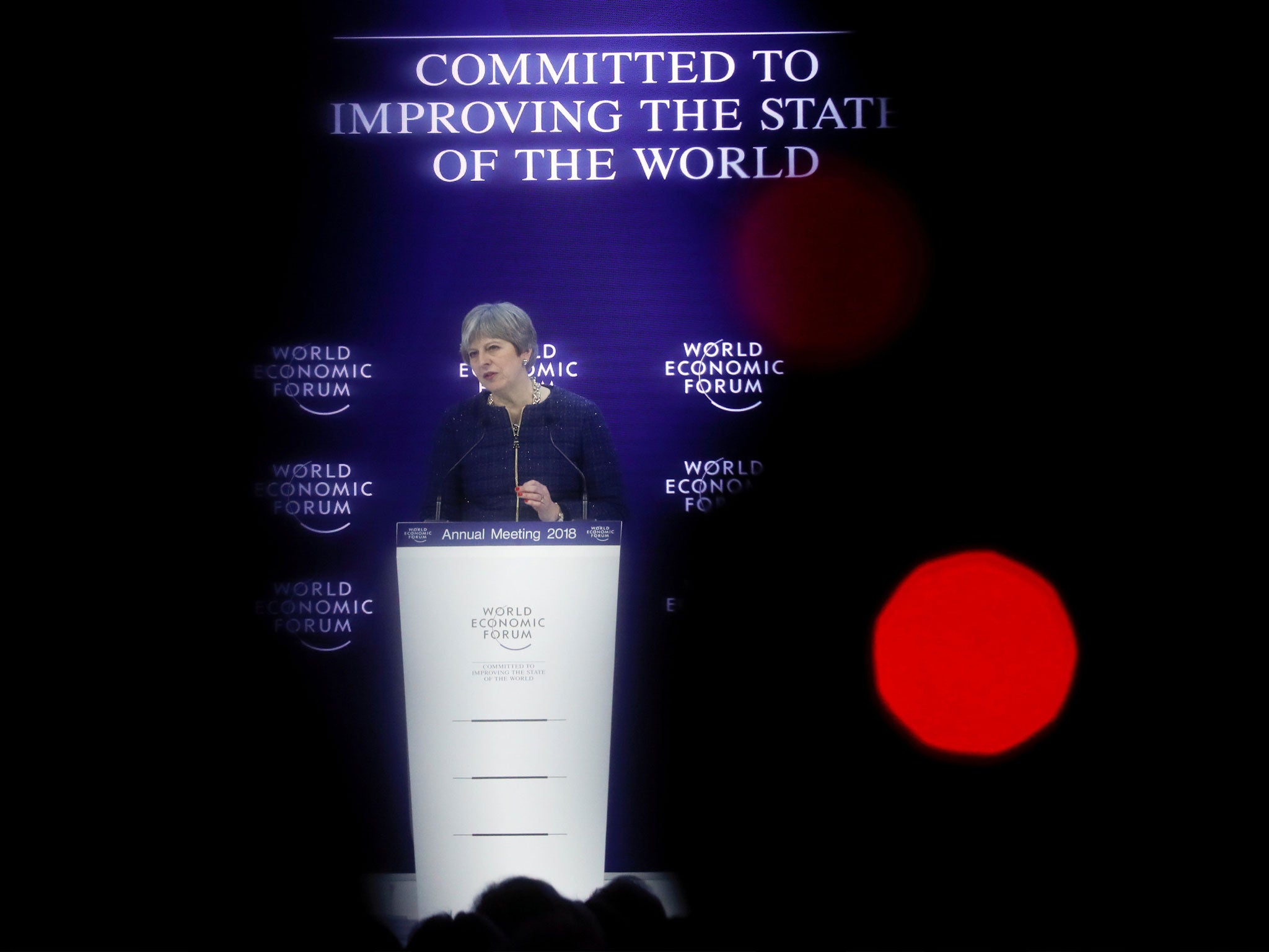 Theresa May addresses a speech during the World Economic Forum (WEF) annual meeting in Davos