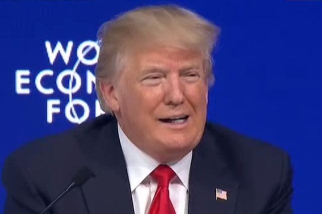 The moment Donald Trump is booed at Davos after attacking the media