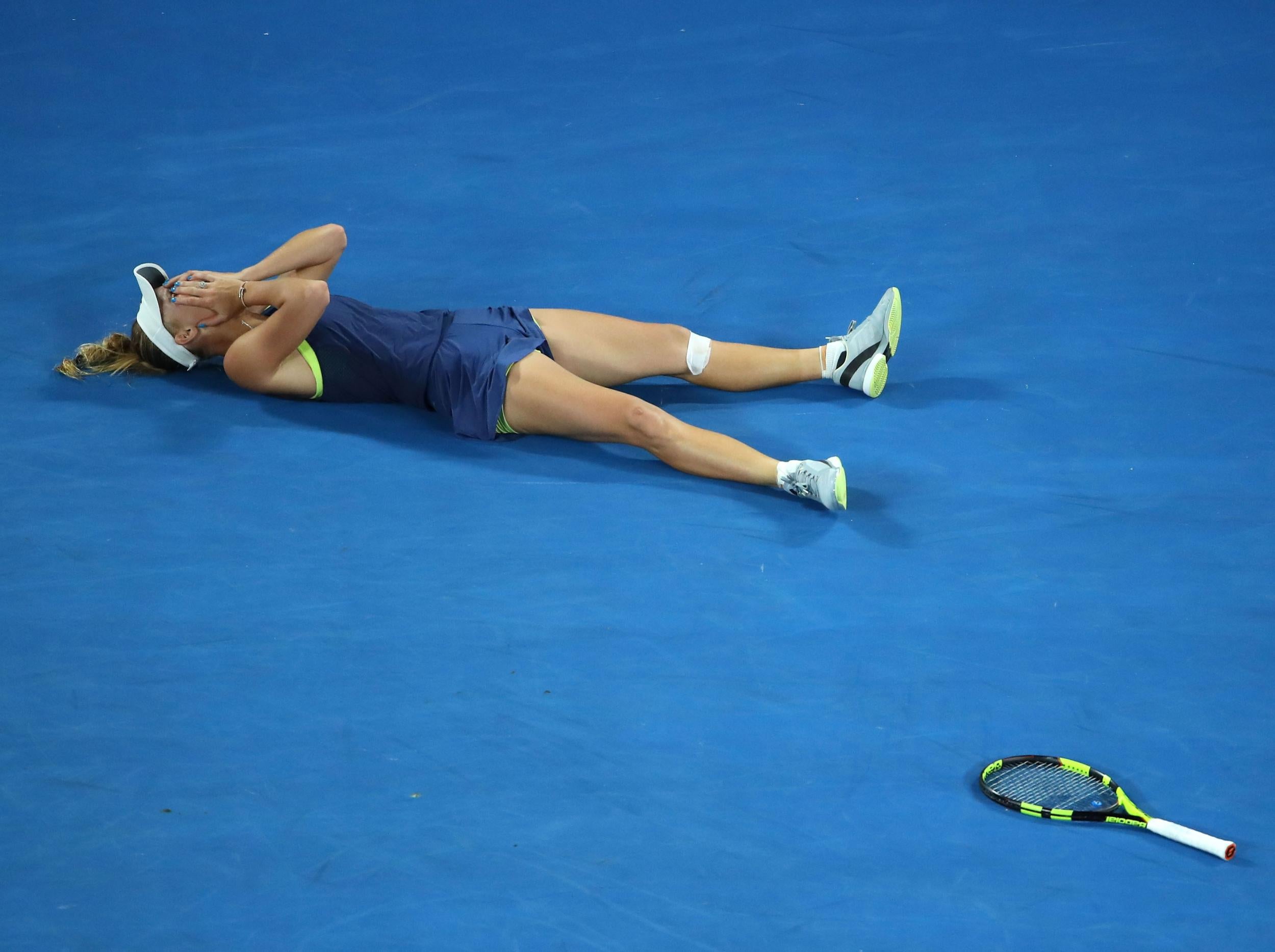 Wozniacki celebrated winning her maiden Grand Slam title