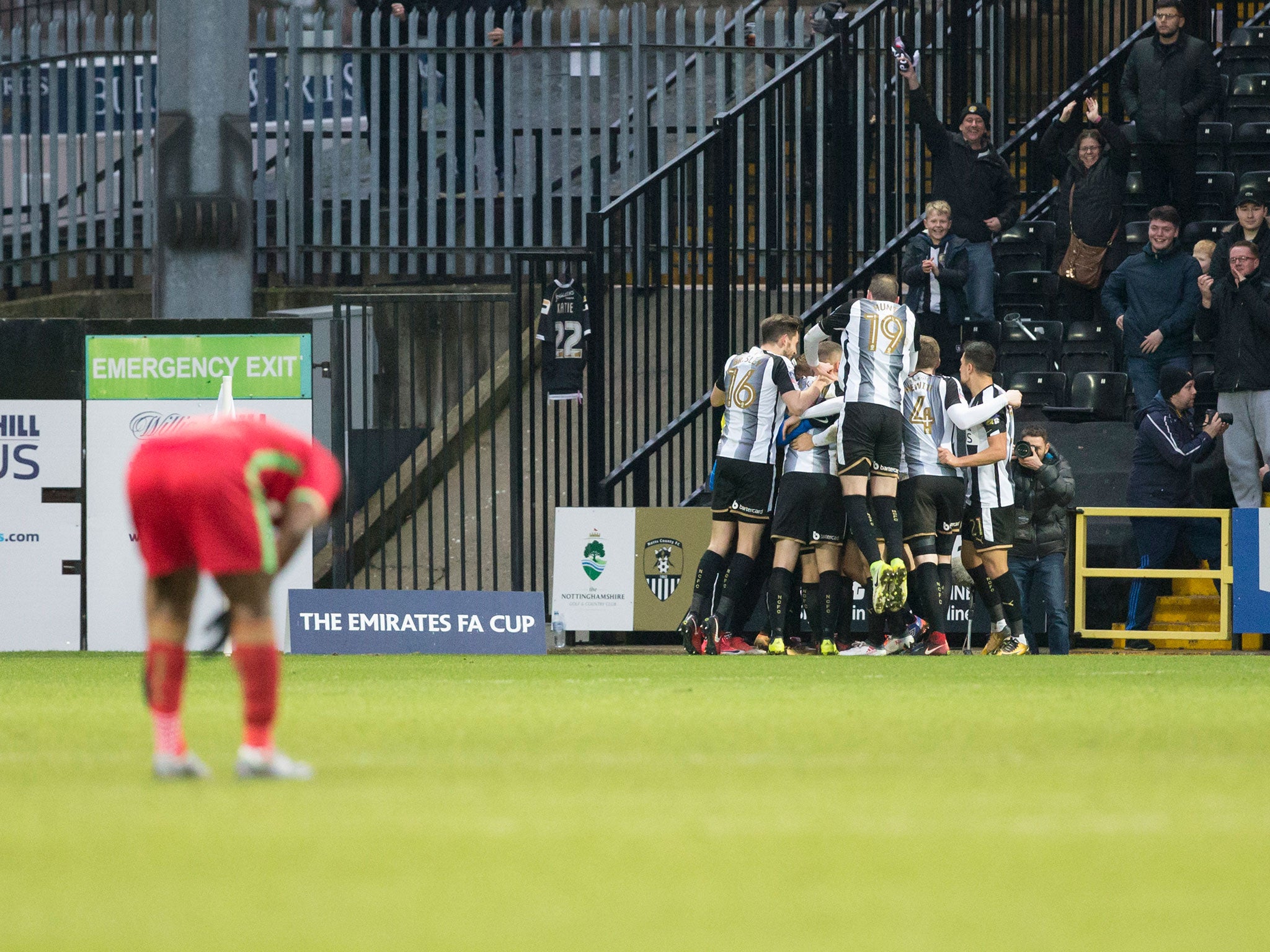 Jon Stead celebrates with his teammates after scoring Notts County's equaliser