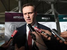 Russian police ‘force’ entry into office of opposition leader Navalny