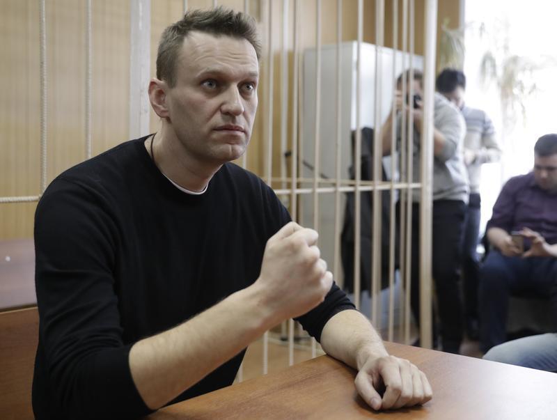 Russian opposition leader Alexei Navalny has called on voters to boycott what he called a rigged presidential election