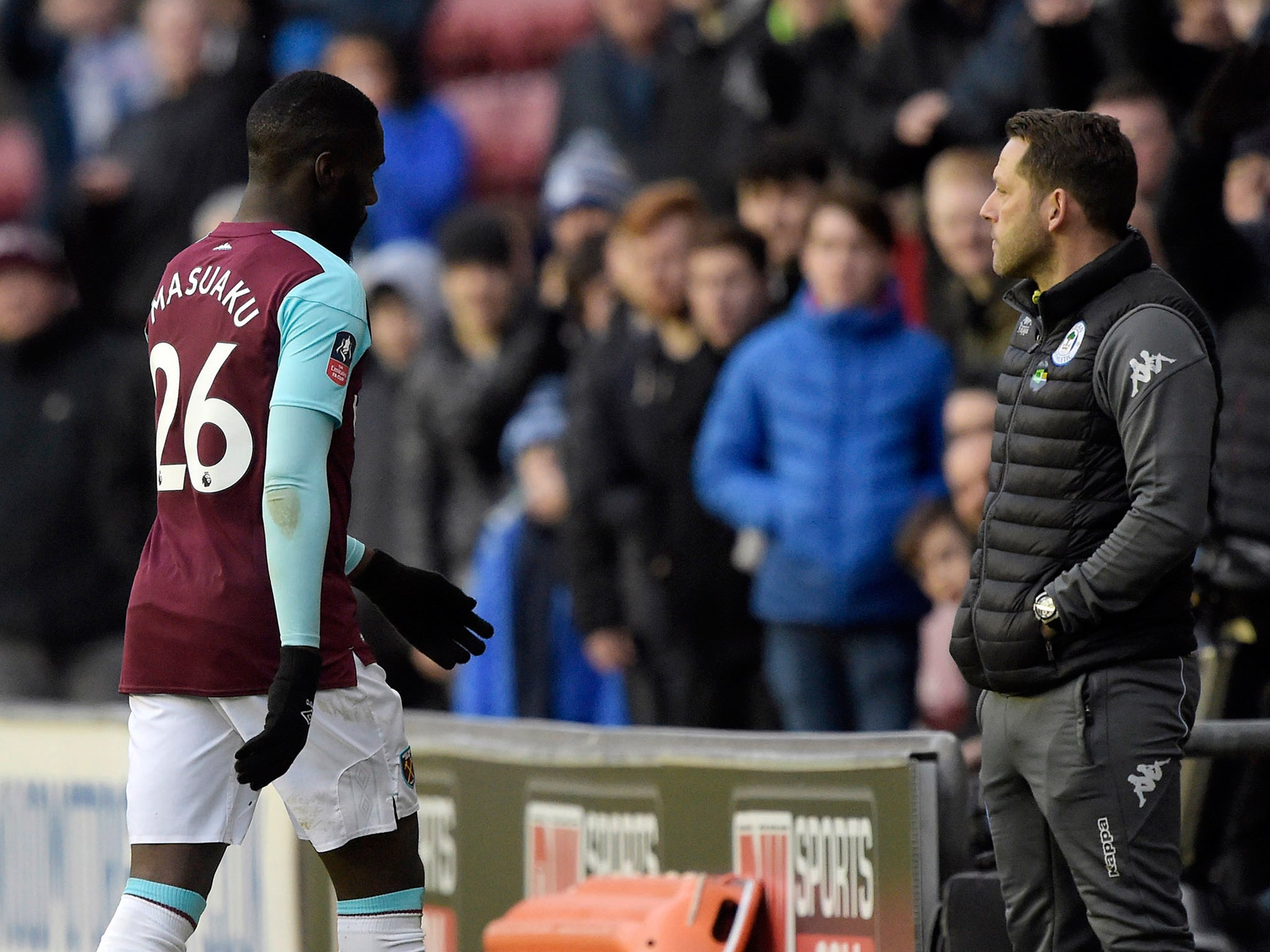 Arthur Masuaku is facing disciplinary action after being sent off for spitting during West Ham's defeat by Wigan