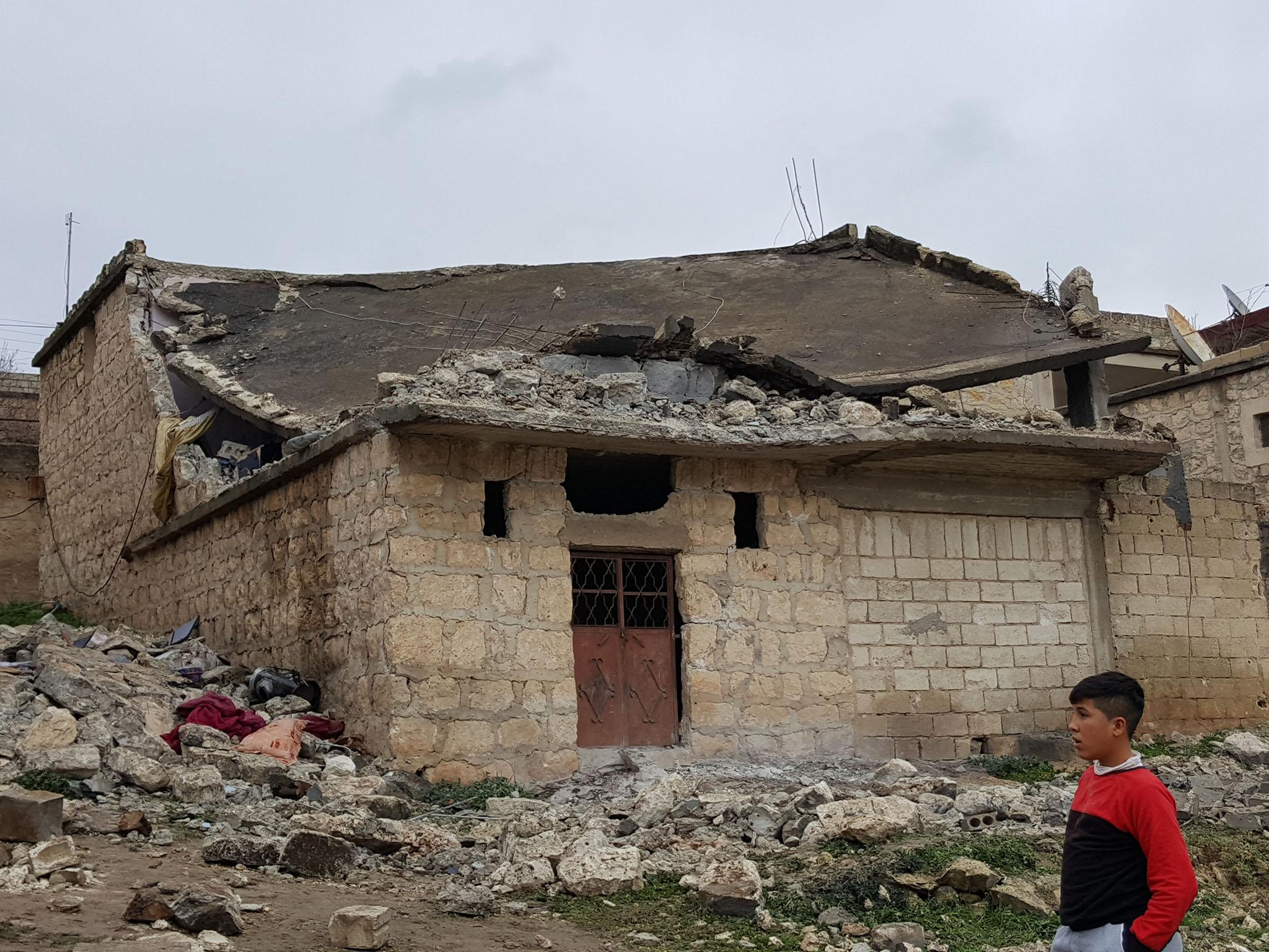 Wreckage of the house struck by a Turkish shell that killed four members of the same refugee Arab family in the Syrian Kurdish village of Mabeta on Friday