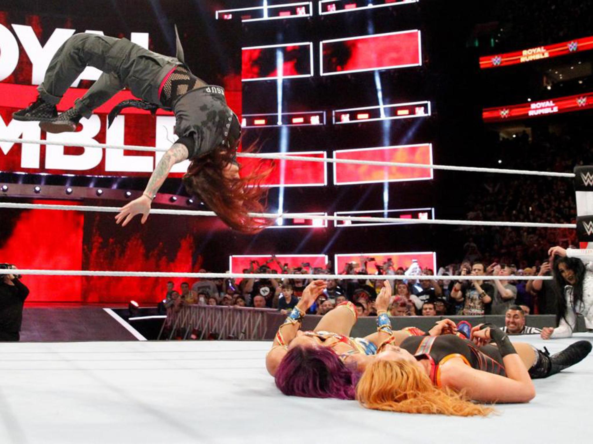 Lita moonsaults onto Sasha Banks and Becky Lynch