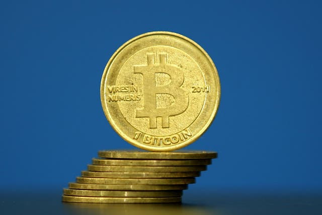 Bitcoin (virtual currency) coins are seen in an illustration picture taken at La Maison du Bitcoin in Paris, France, May 27, 2015