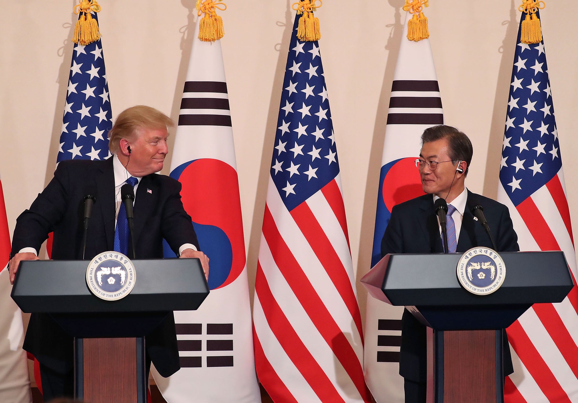 US President Donald Trump talks with South Korean President Moon Jae-in